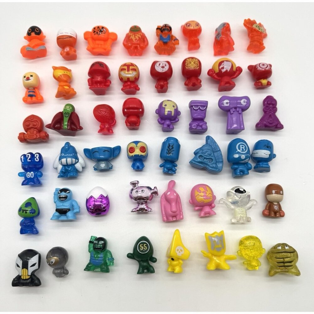 Gogo's Crazy Bones Lot of 64 Gogos Clear Glitter Metallic Misc Figures
